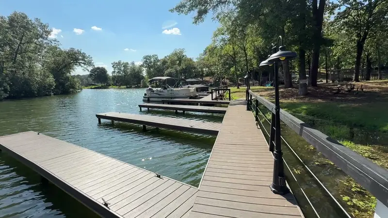 The walkway out to the boat slips, with a pontoon tied up